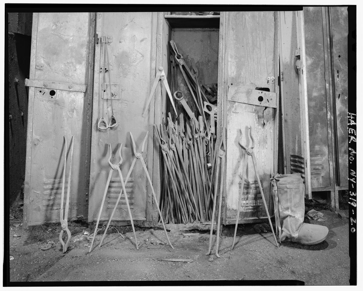 CATCHERS' TONGS AND SAFETY EQUIPMENT USED IN MANIPULATING HOT BARS BY HAND AT THE FINISHING STANDS OF THE 8" MILL. - LTV