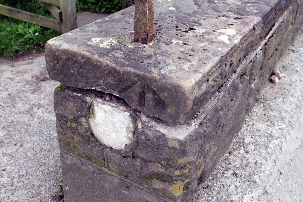 Benchmark on cattle grid wall at Dykesfield Farm
