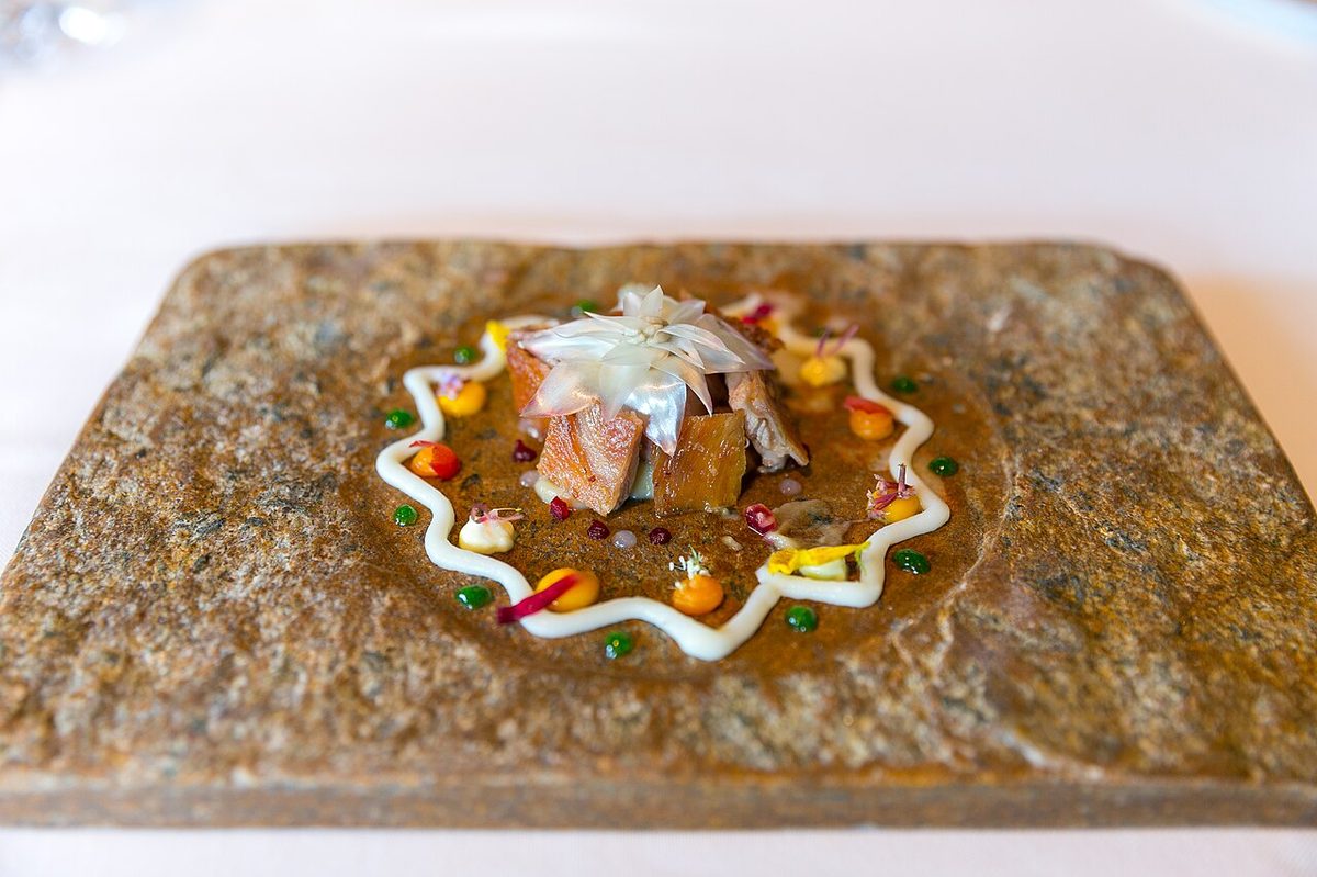 Spicy mandala of artichoke flower, milk-fed lamb belly, lamb sweetbreads, curry yogurt, beetroot, spinach, turnip, lemon